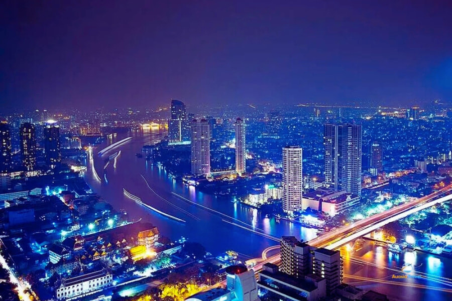 Bangkok skyline and Chao Phraya River lights at night – Auasia Travel